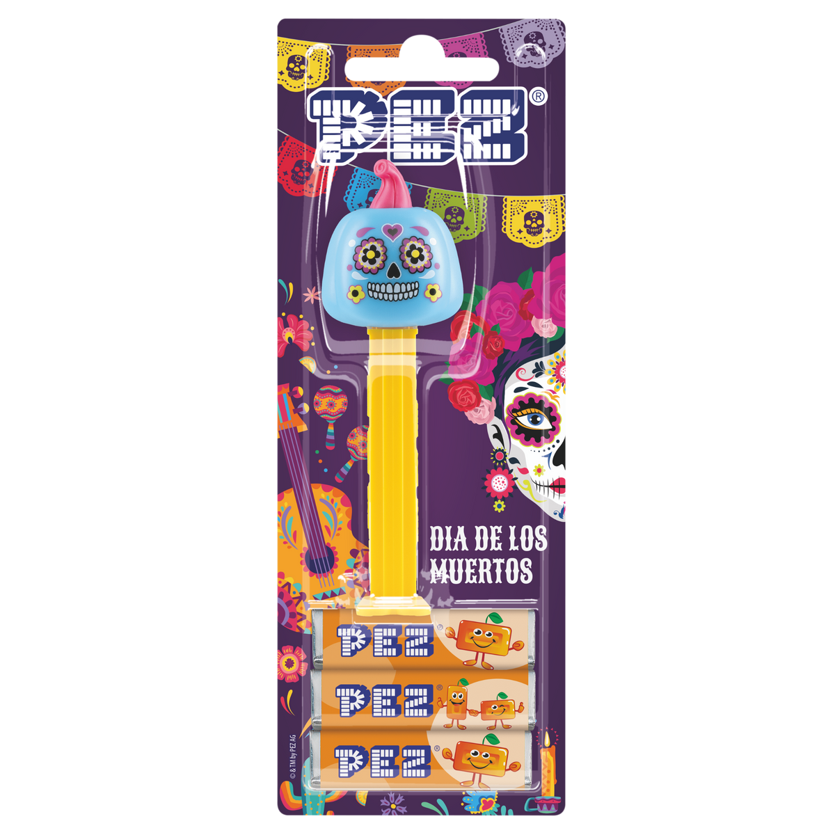 Verpackter PEZ-Spender 'Día de los Muertos' auf einer bunten Blisterkarte mit mexikanischen Totenkopf- und Blumenmotiven sowie drei PEZ-Bonbonpackungen.