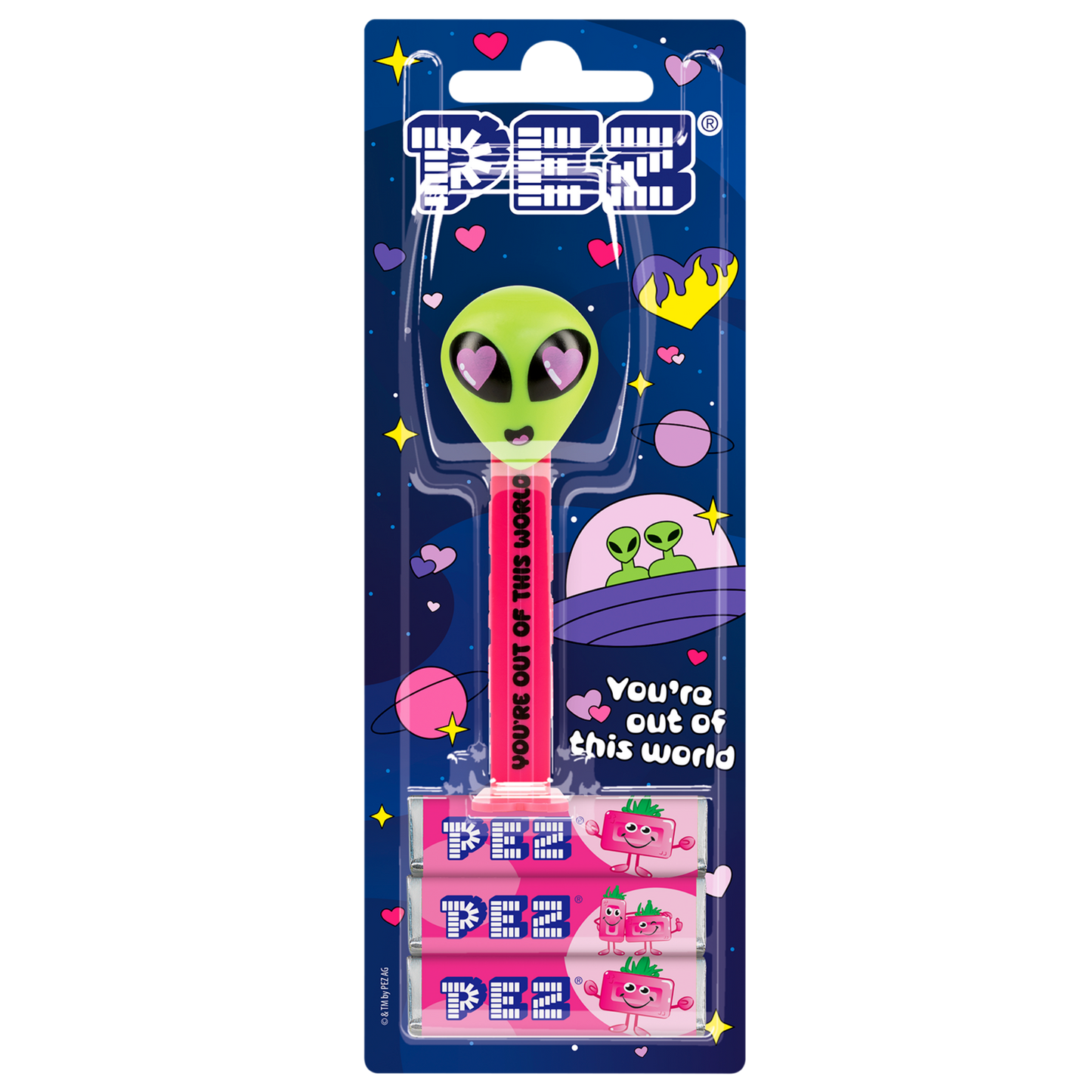 PEZ-Spender mit grünem Alien Kopf und rosa Herzaugen. Das Spendergehäuse ist pink mit schwarzer Aufschrift "You're out of this world".