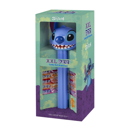 Blauer PEZ-Spender in Form von Stitch aus Disney verpackt. Die Verapackung ist hellgrün und lila und mit Blumen versehen.