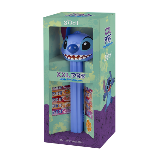 Blauer PEZ-Spender in Form von Stitch aus Disney verpackt. Die Verapackung ist hellgrün und lila und mit Blumen versehen.
